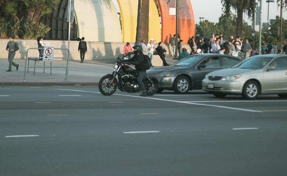 Motorcycle accident attorney in Atlanta Georgia reviewing crash evidence with an injured rider at Karma Injury Law